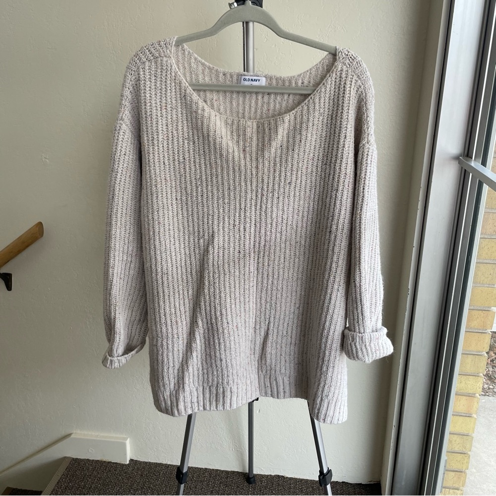 Cream sweater with speckled color flecks throughout
